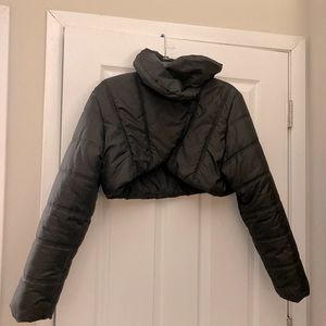 Short black puffer coat.